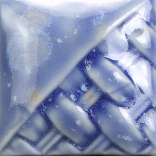 Cone 6: Floral blue glaze with yellow/white crystals; blooms appear as crystals melt, fading slightly at Cone 10. Amaranth Stoneware Canada.