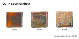 Solar Rainbow is a highly fluid, dark gloss glaze with iridescent rainbow crystals. Breaks translucent. Amaranth Stoneware Canada.