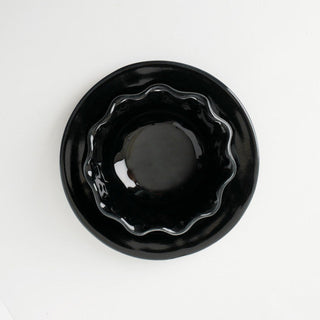 DL-1 Ebony is an opaque glossy black glaze, great as a base for layering or on its own. Amaranth Stoneware Canada.