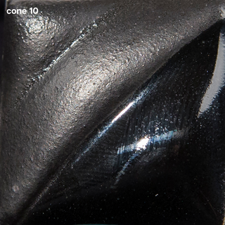 Jet Black Velvet Underglaze is a cool black, velvety at Cone 05, darker at Cone 5, and deep black with slight gloss at Cone 10. Clear glaze enhances. Amaranth Stoneware Canada.