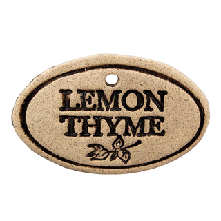 Garden Markers: white stoneware, 3.5"x2.25", weatherproof, rustproof hanger included. Unique leaf design. Handcrafted in Kingston, Ontario at Amaranth Stoneware.