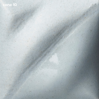 Morning Fog Velvet Underglaze fires to a light gray at cone 05, darkens at cone 5, and maintains its foggy color at cone 10. Amaranth Stoneware Canada.