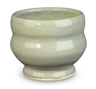 Sage is an opaque, warm gray green glaze that has subtle, frothy tones of pink. Amaranth Stoneware Canada.