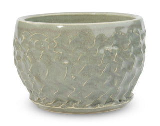 Sage is an opaque, warm gray green glaze that has subtle, frothy tones of pink. Amaranth Stoneware Canada.