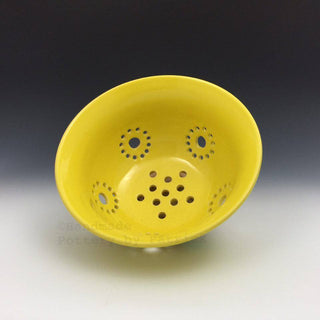 Piece by Patrick Scheg. Buttercup glaze, bright cheerful yellow, ideal for accents and contrasts. Amaranth Stoneware Canada.