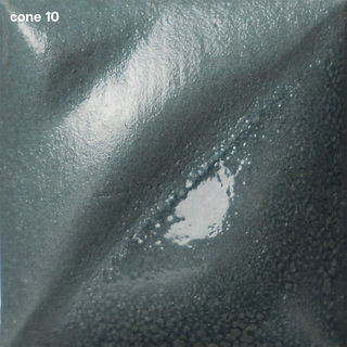 Slate Velvet Underglaze is a bluish-gray at cone 05, deepens to slate at cone 5, and turns blue-green at cone 10. Amaranth Stoneware Canada.