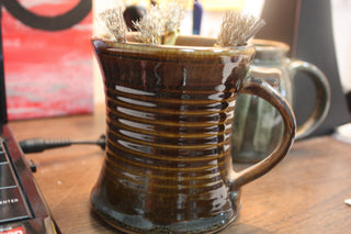 Glossy Opulence Glazes reveal texture beautifully, are food-safe, and lead-free. Ideal for unique designs. Amaranth Stoneware Canada.
