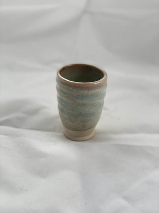Antique Pearl glaze, varied appearance based on application and firing. Amaranth Stoneware Canada.
