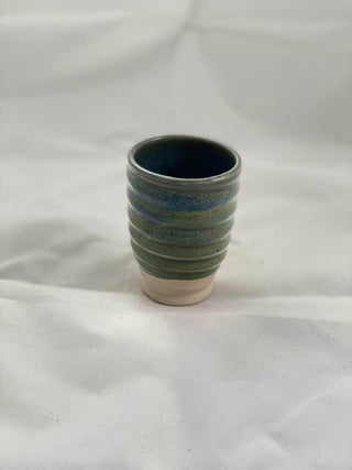 A versatile glaze category that showcases dramatic variations in appearance based on clay type, application thickness, and firing conditions; known for their runniness, requiring careful testing for optimal results.