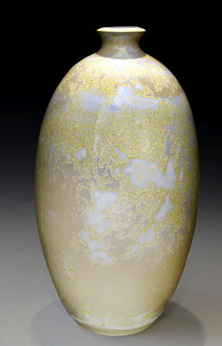 A white and transparent glaze that grows large white and gold crystals when slow-cooled. Ideal for vases. Amaranth Stoneware Canada.