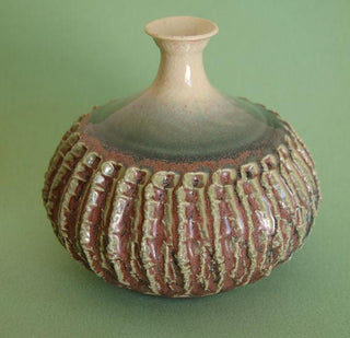 Eggplant glaze, a dynamic finish that transitions from matte purple to glossy green with intense blue crystals when slow-cooled. Amaranth Stoneware Canada."