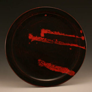 Solid black glaze, opaque with a smooth, glossy finish. Amaranth Stoneware Canada.