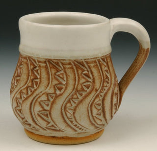 A smooth, off-white glaze ideal as a liner for functional ware, Alabaster Satin works well with underglaze. Amaranth Stoneware Canada.