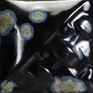 Night Moth opaque gloss glaze with crystals blooming into sage and gray at Cone 6.
At Cone 10: No change. Amaranth Stoneware Canada.