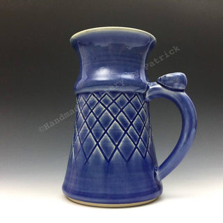 A deep, clear blue that pools darker. Perfectly translucent for details or underglaze. A stunning addition to your work! Amaranth Stoneware Canada.