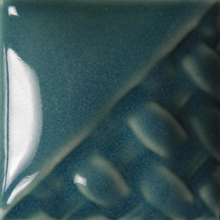Peacock translucent teal gloss at Cone 6; one coat provides a hint of color, two to three coats deepen color while remaining translucent.
At Cone 10: Color lightens. Amaranth Stoneware Canada.