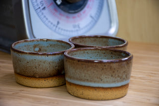 Practical Bee ramekins: speckled tan stoneware, 3 colors, perfect for dips or desserts, 1.75"x2.75". Handmade in Kingston, Ontario at Amaranth Stoneware.