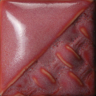 Raspberry Mist gloss, semi-opaque glaze with dark and light pink shades at Cone 6; thicker coats create more homogenous color.
At Cone 10: Color darkens to deep red. Amaranth Stoneware Canada.