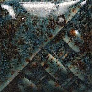 Shipwreck is an aquamarine gloss glaze with an iron crystal at Cone 6.
At Cone 10: Color darkens. Amaranth Stoneware Canada.