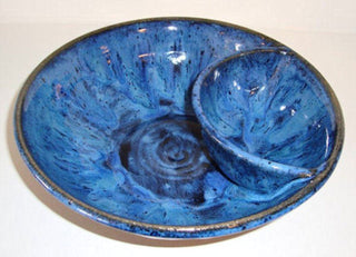 Solid black glaze, opaque with a smooth, glossy finish. Amaranth Stoneware Canada.