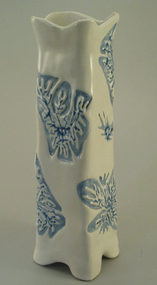 Eggshell glaze, a stable and glossy finish that offers a less bright alternative to white, ideal as a liner glaze for functional ware. Amaranth Stoneware Canada.