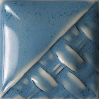 Cone 6: Medium blue semi-transparent to opaque gloss glaze. Thinner applications yield a blue haze; thicker coats are opaque. Amaranth Stoneware Canada.