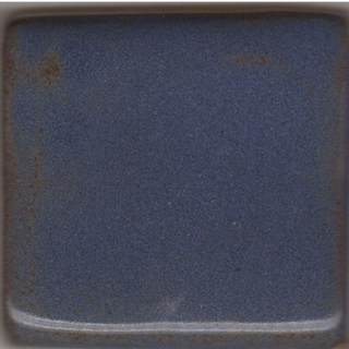 Blue Shino glaze, dark blue where thick and reddish-brown where thin. Amaranth Stoneware Canada.