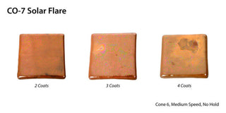 Solar Flare is a glossy, opaque light brown glaze with an iridescent, crystalline texture. Fluid with slight crystal texture. Amaranth Stoneware Canada.