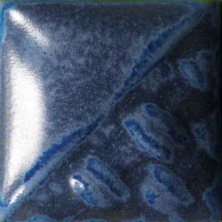 Cone 6: Variegated blue glaze that breaks over texture; finishes semi-gloss with blue/green at Cone 10. Amaranth Stoneware Canada.