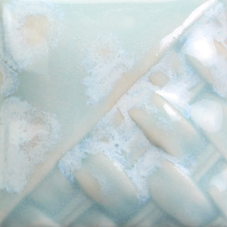 Cone 6: Turquoise semi-transparent gloss glaze with white crystals; color lightens while crystals remain at Cone 10. Amaranth Stoneware Canada.