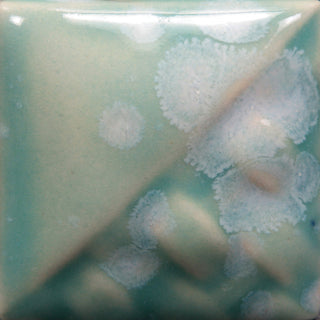 Cone 6: Turquoise semi-transparent gloss glaze with white crystals; color lightens while crystals remain at Cone 10. Amaranth Stoneware Canada.