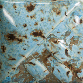 Cone 6: Semi-opaque sky blue gloss glaze with melting brown crystals; base color darkens, and crystals become darker and more defined at Cone 10. Amaranth Stoneware Canada.