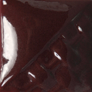 Cone 5/6: Deep burgundy red with a semi-gloss finish' changes to dark metallic gray with copper/black mottling at Cone 10. Amaranth Stoneware Canada.