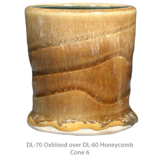 DL-60 Honeycomb is a satiny golden-yellow glaze with darker texture where thicker. Minimal movement when fired; ideal for accents or layering