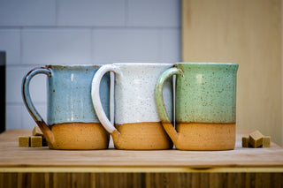 Practical Bee mugs: speckled tan clay, farmhouse-inspired glazes, microwave/dishwasher safe, 4.5" x 3". Handmade in Kingston, Ontario at Amaranth Stoneware.