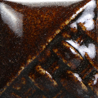 Cone 6-10: Gloss semi-transparent glaze with a rich brown base and tiny gold flecks; darkens with metallic mottling at Cone 10. Amaranth Stoneware Canada.