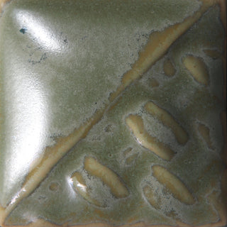 Cone 6: Variegated sage green glaze that breaks over texture and can produce a glossy blue finish. Cone 10: Changes to a variegated pink/blue/green. Amaranth Stoneware Canada.