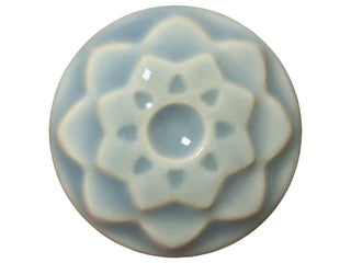 Glossy, ice blue glaze. Cone 5-6. Dinnerware Safe. Safe for Spray Application. Mixable. Amaranth Stoneware.