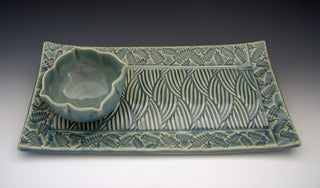 Aqua glaze, translucent blue-green similar to celadon. Amaranth Stoneware Canada.