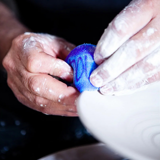 Mudsponge Blue Workhorse is a durable, eco-friendly, absorbent sponge shaped like a potter’s rib. Expands with water. Amaranth Stoneware Canada.