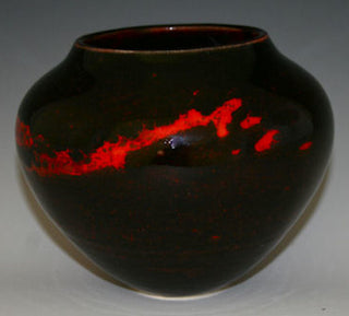 Solid black glaze, opaque with a smooth, glossy finish. Amaranth Stoneware Canada.