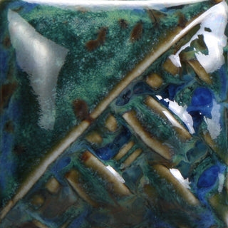 Midnight Rain Cone 6 glaze, blue-green gloss with black crystal that creates oil-like streaks; crystals melt and darken the color at Cone 10 with increased movement. Amaranth Stoneware Canada.