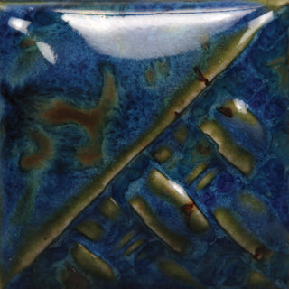 Midnight Rain Cone 6 glaze, blue-green gloss with black crystal that creates oil-like streaks; crystals melt and darken the color at Cone 10 with increased movement. Amaranth Stoneware Canada.