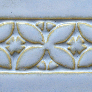 Arctic Blue is an opaque light blue glaze that breaks tan over texture and layers well. Amaranth Stoneware Canada.