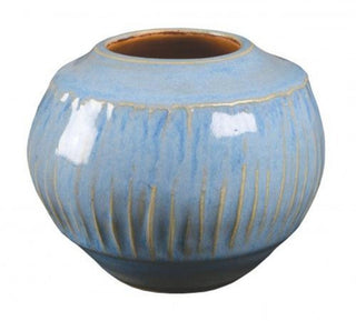 Arctic Blue is an opaque light blue glaze that breaks tan over texture and layers well. Amaranth Stoneware Canada.