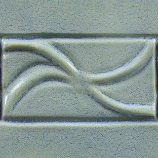 Frosted Turquoise is an opaque gray-blue glaze that appears to crackle over deep blue but has a smooth, satiny surface. Amaranth Stoneware Canada.