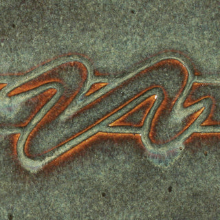Iron Lustre is brown where thin with blue-gray floats where thick. Amaranth Stoneware Canada.