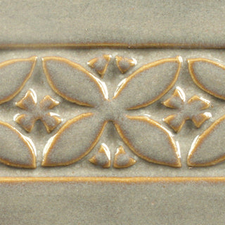 Light Sepia is an opalescent grey glaze that features strong variations on textured ware. Amaranth Stoneware Canada.