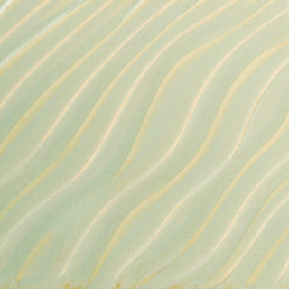 Glossy pale green Melon glaze, breaking on texture with peachy float, great for layering. Amaranth Stoneware Canada.