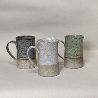 Practical Bee mugs: speckled tan clay, farmhouse-inspired glazes, microwave/dishwasher safe, 4.5" x 3". Handmade in Kingston, Ontario at Amaranth Stoneware.